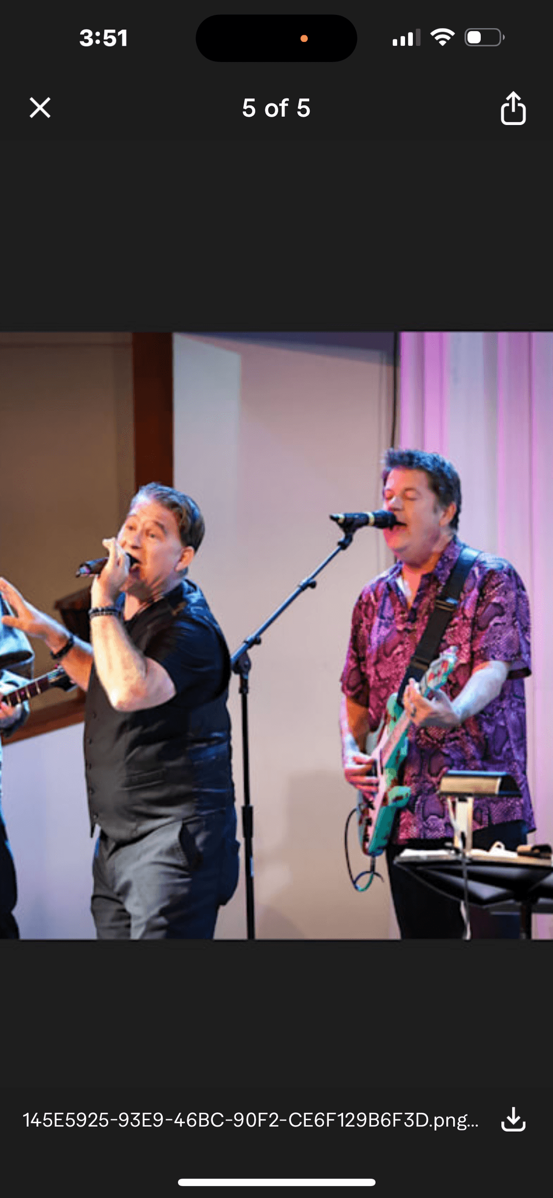 JC Grigg singing and Keith Howland on guitar at concert